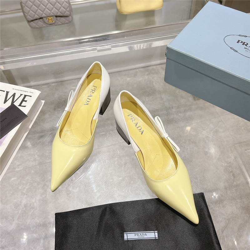 Pra*a chunky pointed pumps in yellow and white calfskin