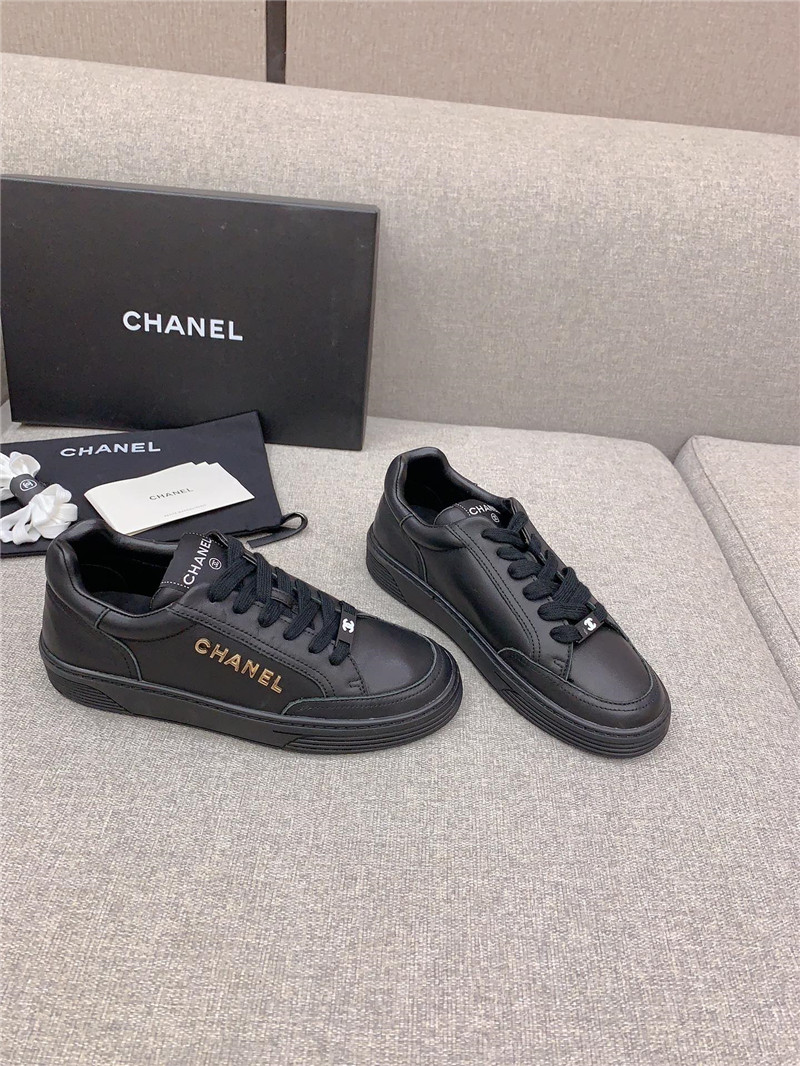 Ch**el black leather lace-up trainers
