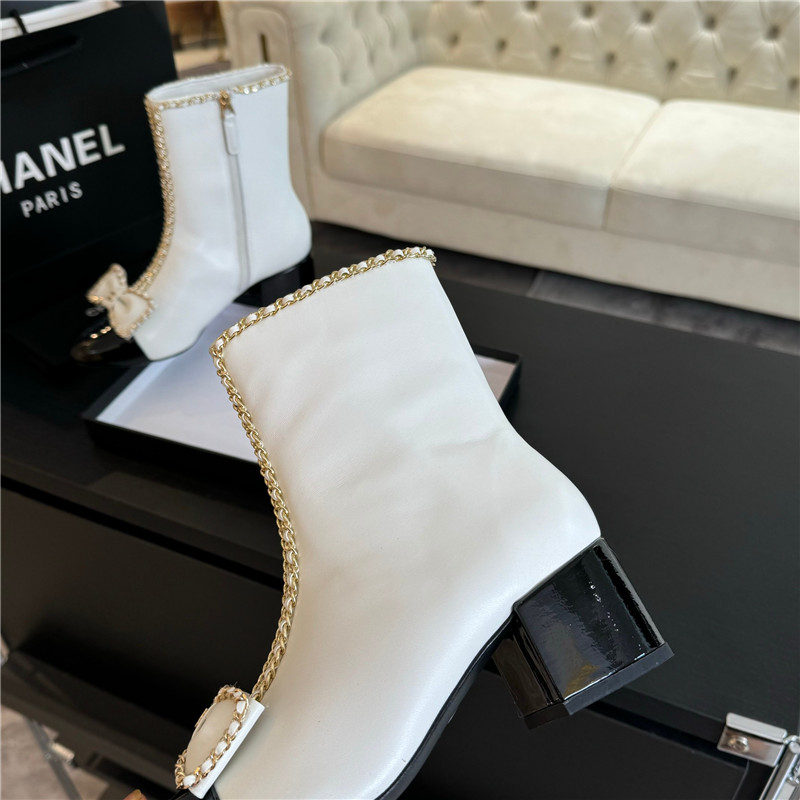 Ch**el white calfskin bow patent leather ankle boots