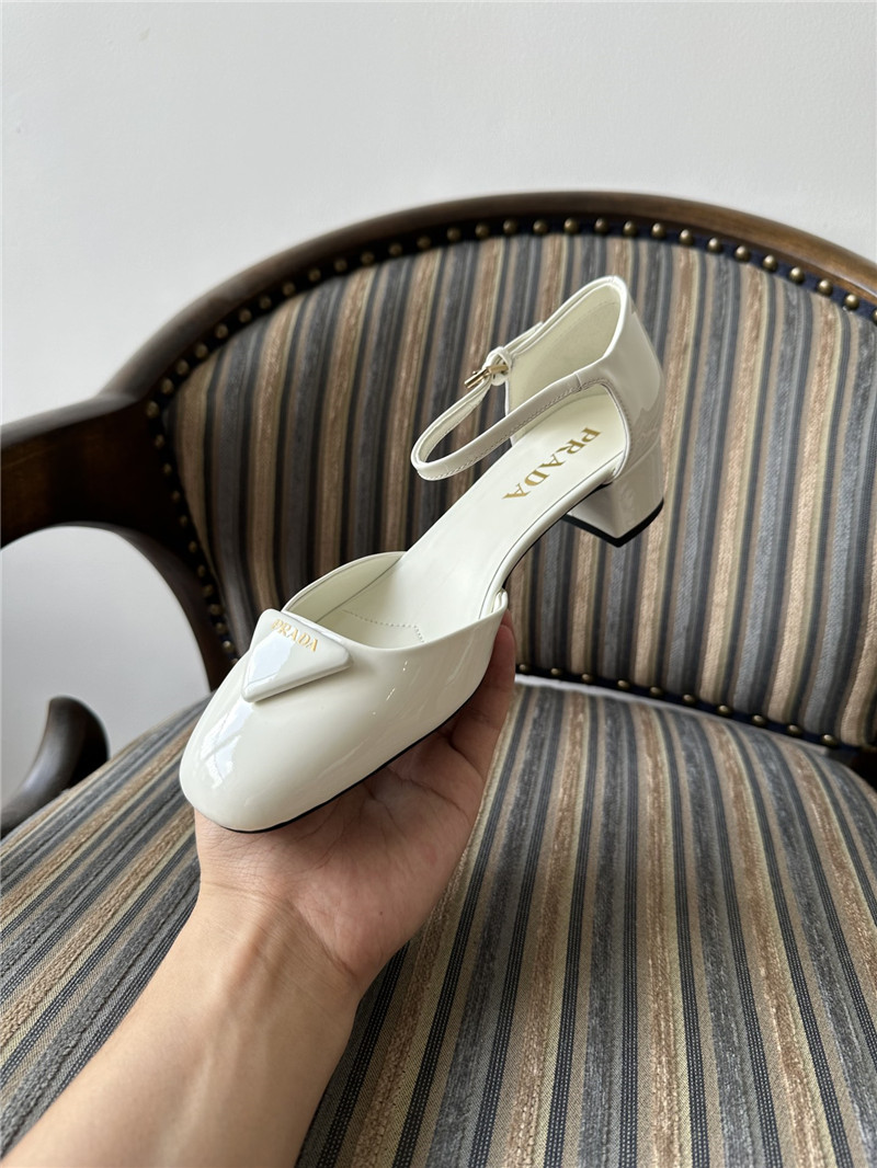 Pra*a white 35mm triangle-logo patent-leather pumps