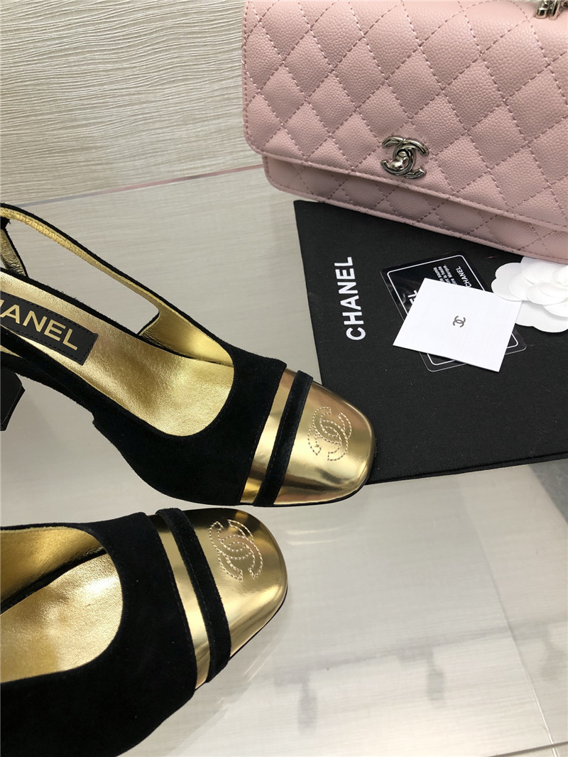 Ch**el black suede and gold leather slingbacks