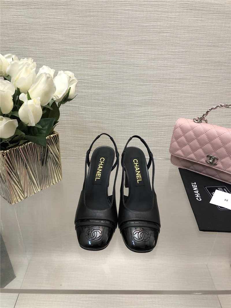 Ch**el black goatskin and patent leather slingbacks