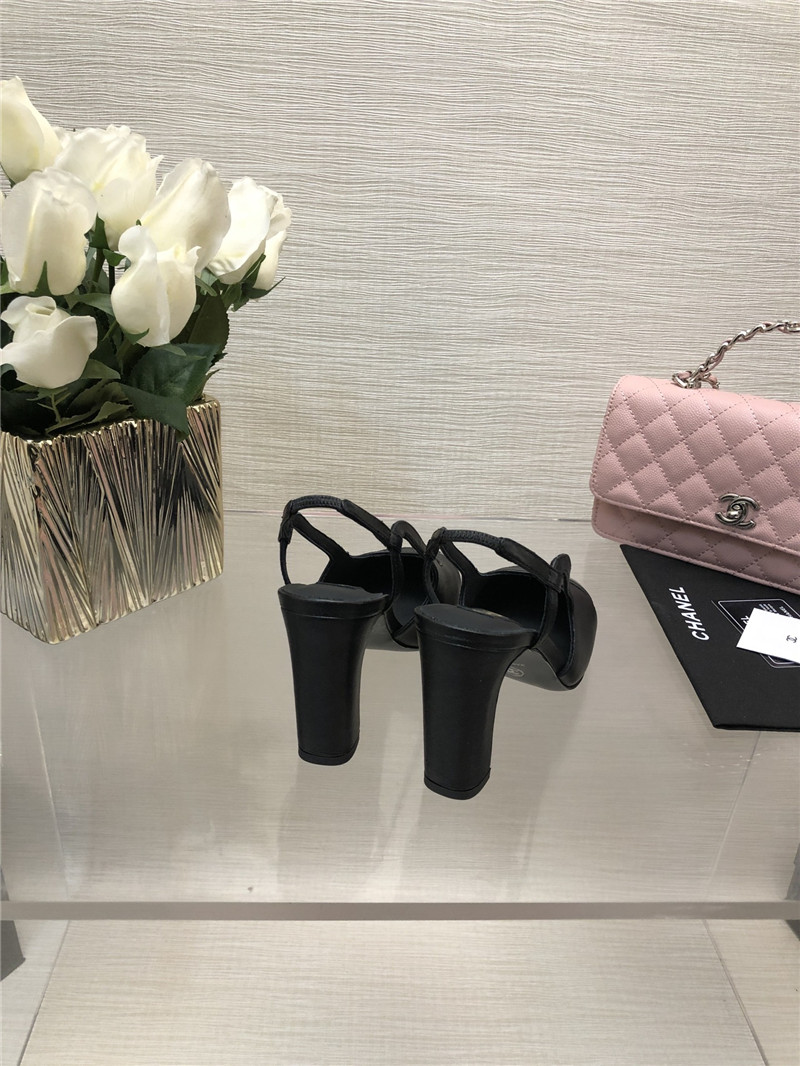 Ch**el black goatskin and patent leather slingbacks
