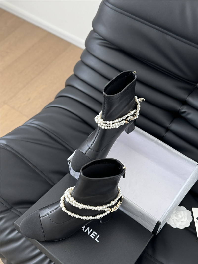 Ch**el black calfskin pearl ankle boots