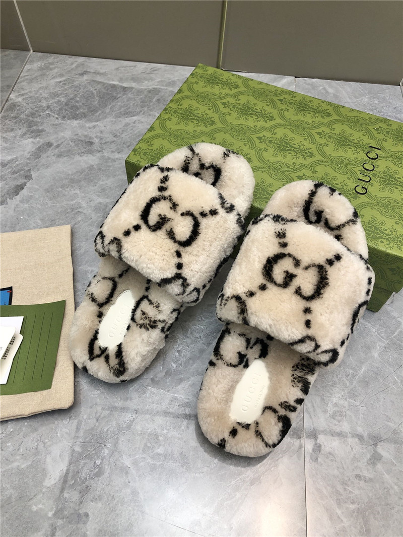 Gvc*1 monogram motif shearling slides natural