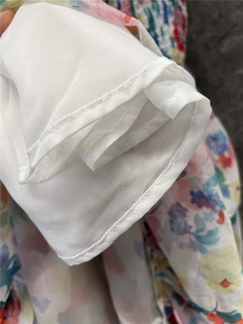Ganni small floral ruffle sling cake dress replica clothing sites
