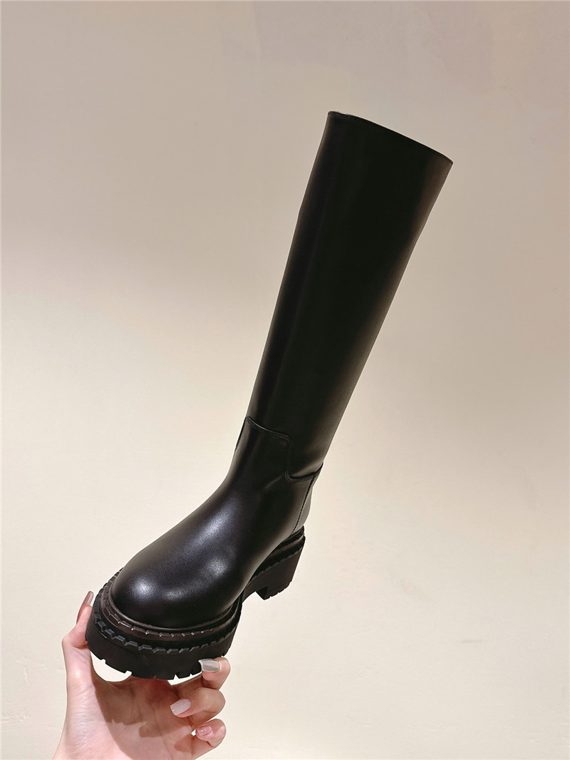 Pra*a black knee-high boots for women