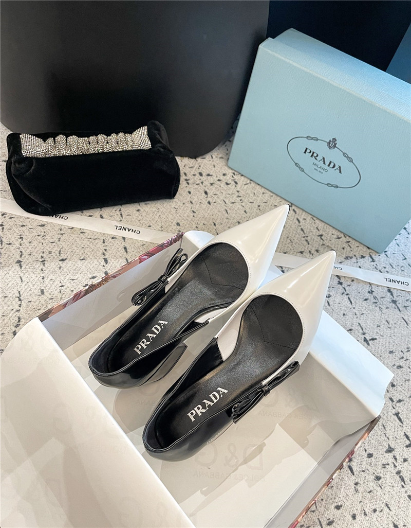 Pra*a bow black/white brushed leather pumps