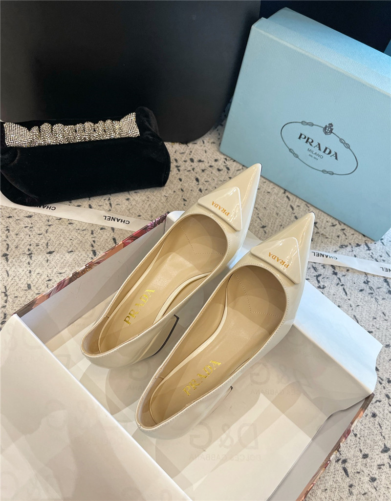 Pra*a triangle logo ivory brushed leather pumps