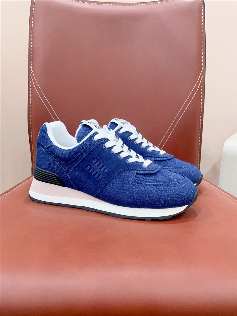 Miu Miu x New Balance 574 Leather Sneakers in Blue