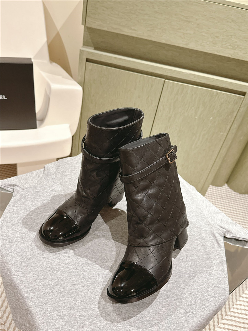 Ch**el black quilted leather cap toe ankle boots