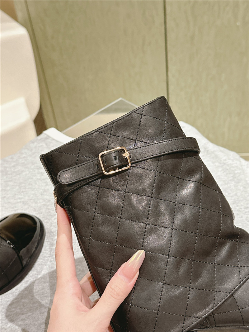 Ch**el black quilted leather cap toe ankle boots