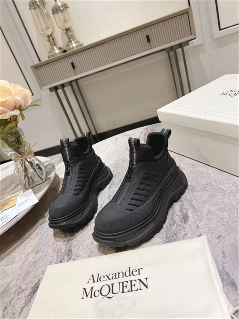 a1exa*der Mcqv*en black zip-up low top sneakers
