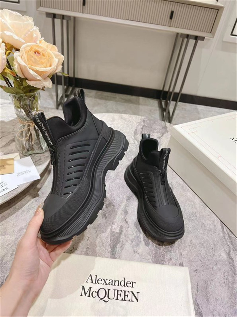 a1exa*der Mcqv*en black zip-up low top sneakers