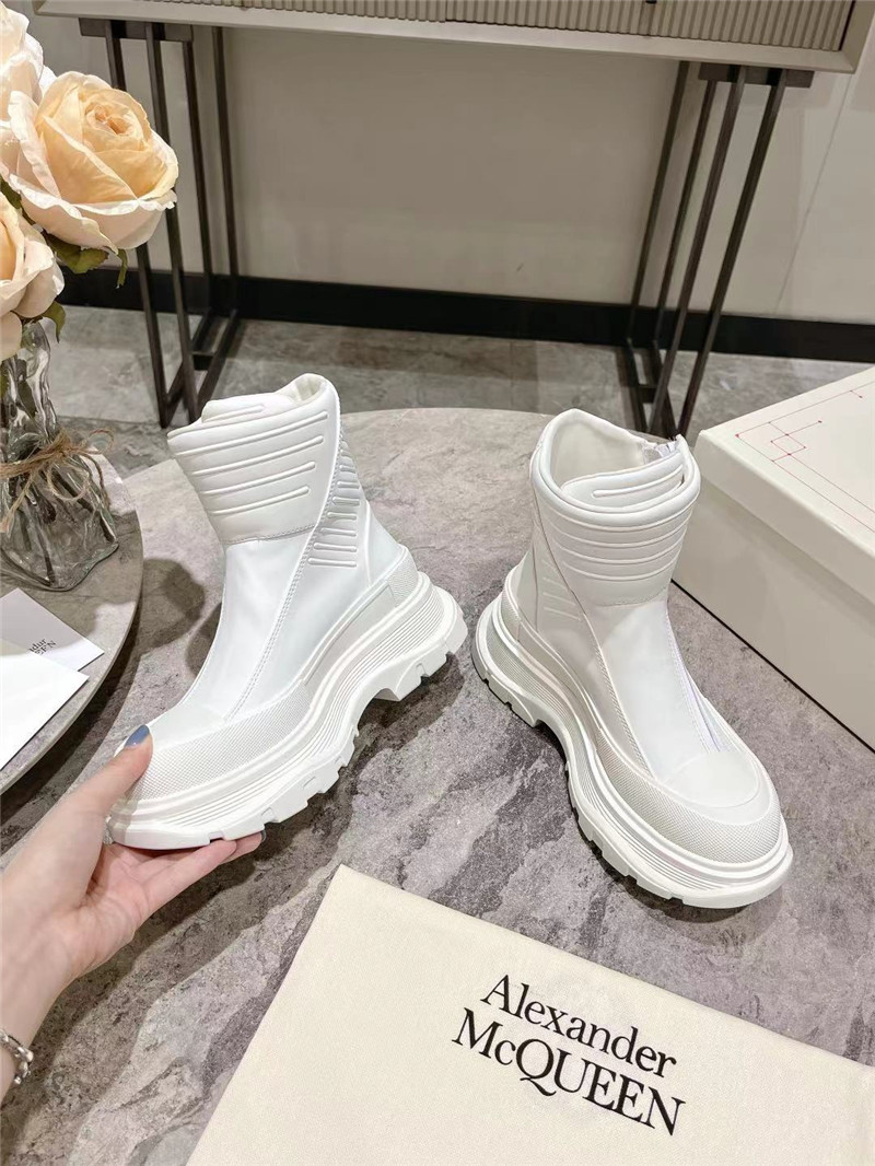 a1exa*der Mcqv*en white tread slick high top sneakers
