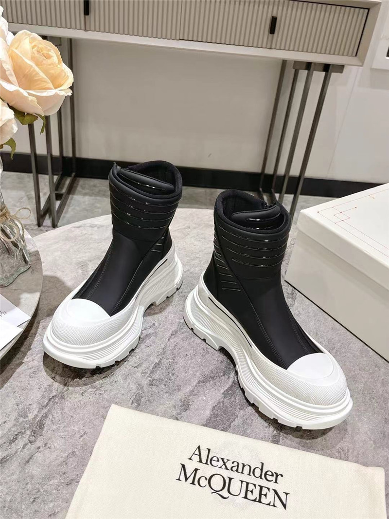 a1exa*der Mcqv*en tread slick high top sneakers