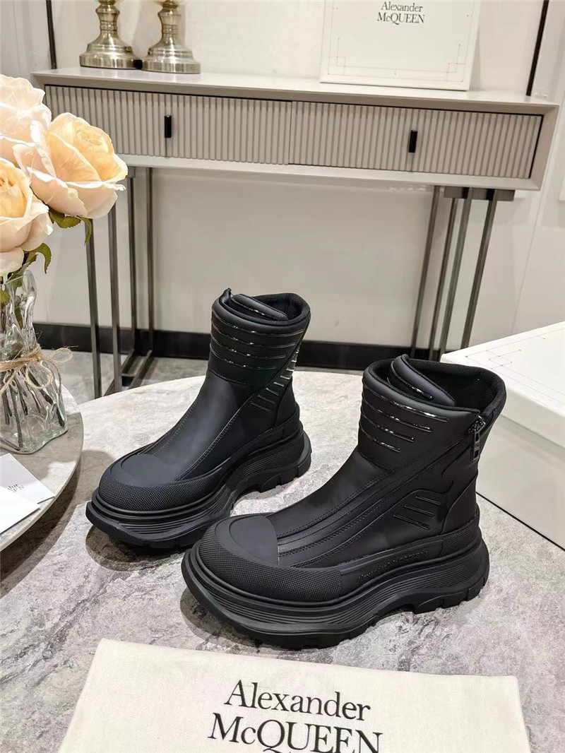 a1exa*der Mcqv*en black tread slick high top sneakers