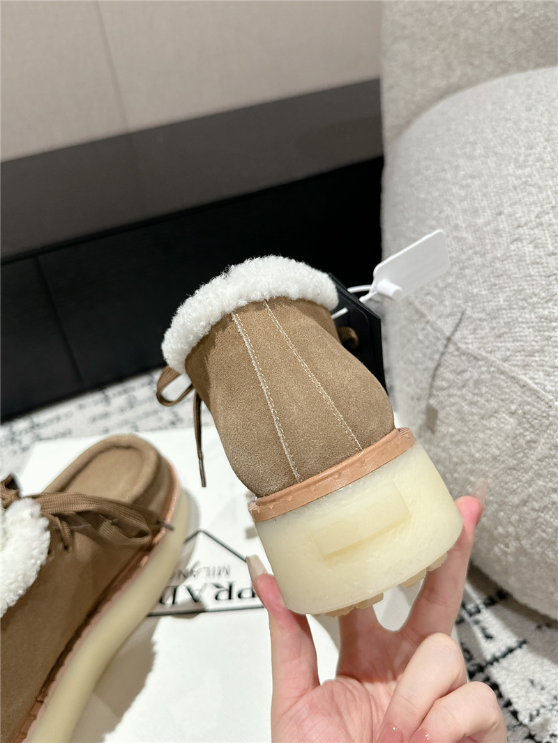 Pra*a beige suede shearling platform ankle boots