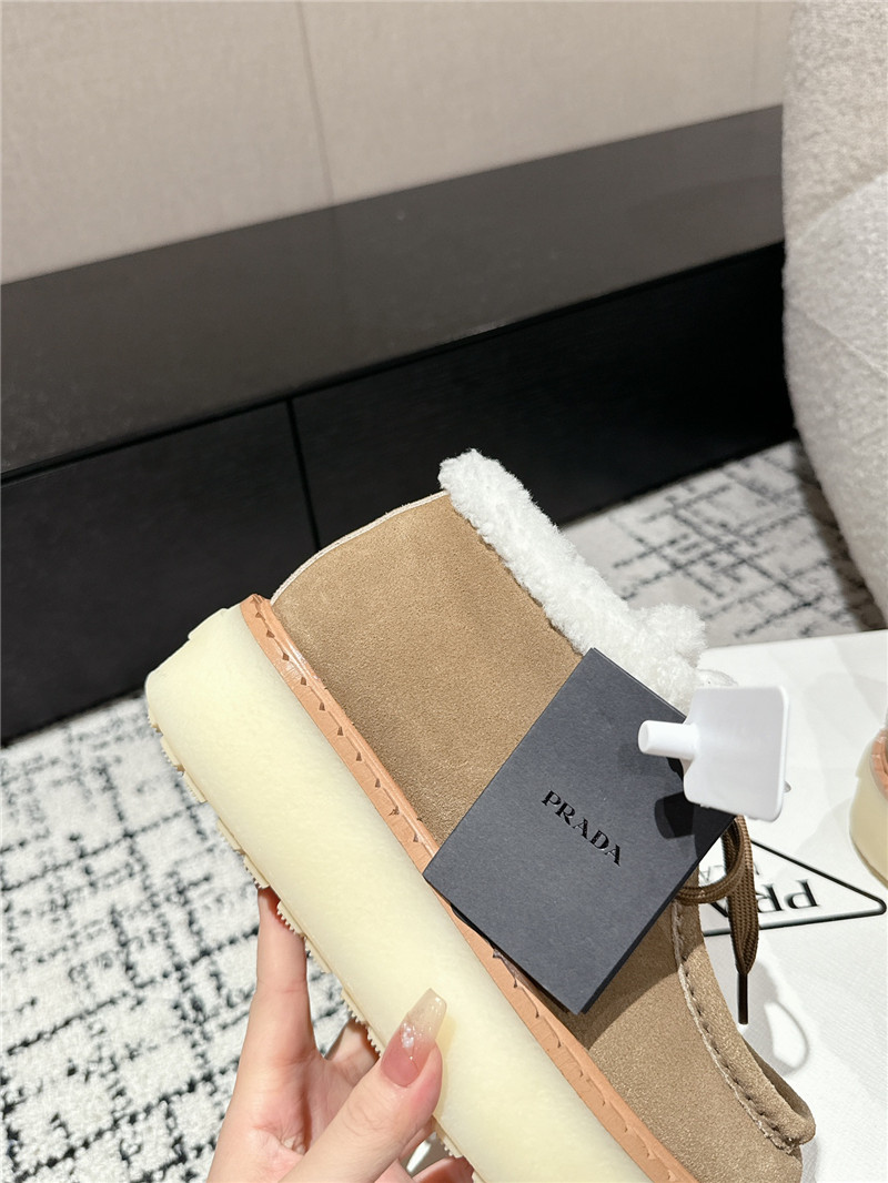 Pra*a beige suede shearling platform ankle boots