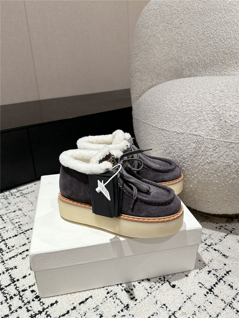 Pra*a gray suede shearling platform ankle boots