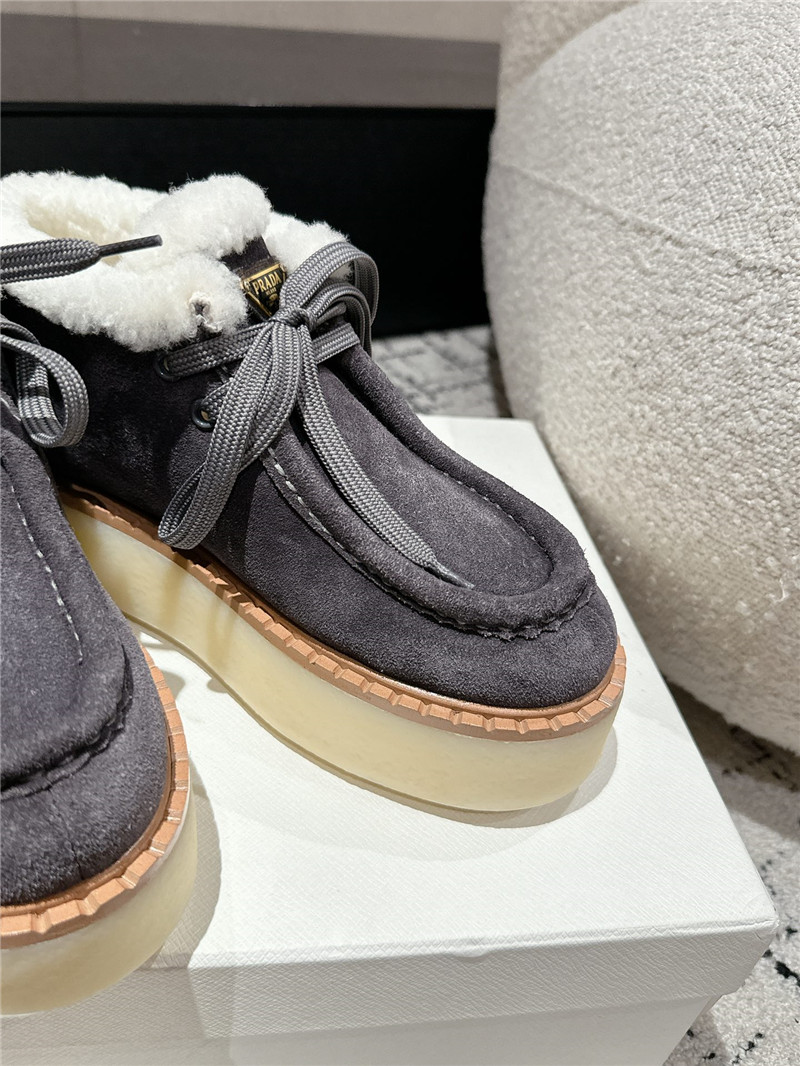 Pra*a gray suede shearling platform ankle boots