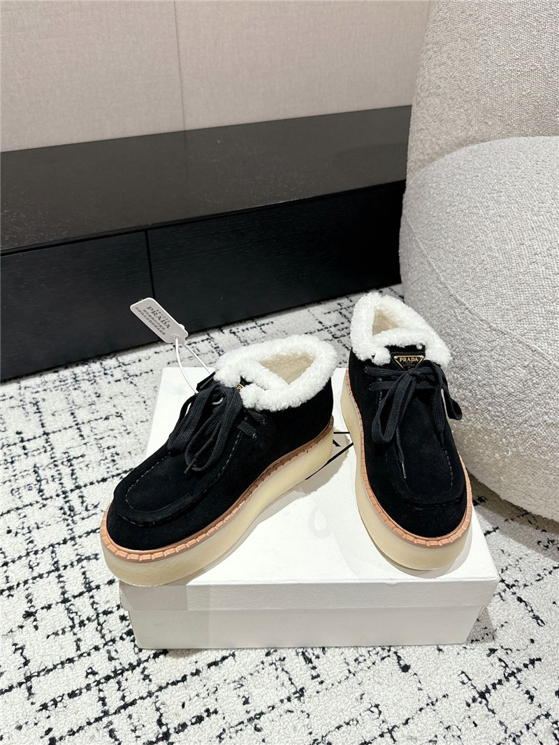 Pra*a suede shearling platform ankle boots