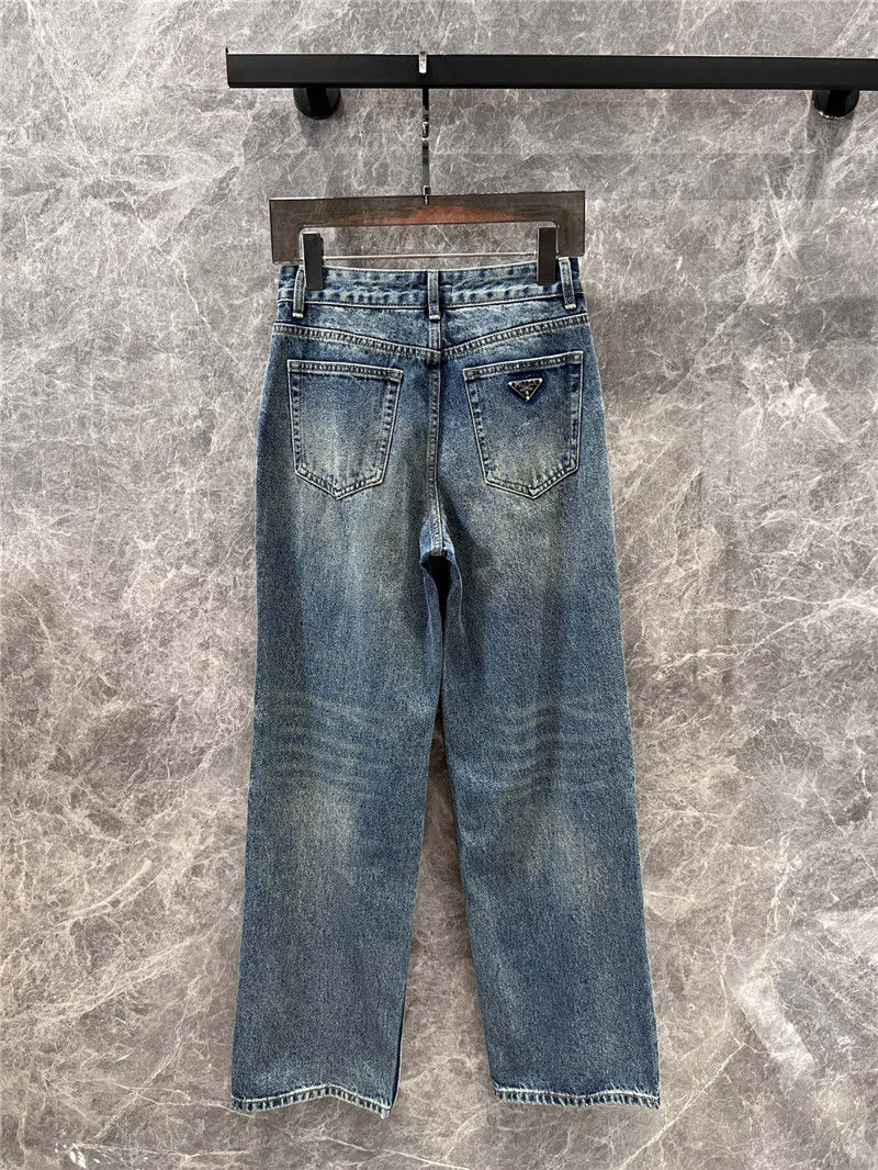 Pra*a triangle logo denim trousers
