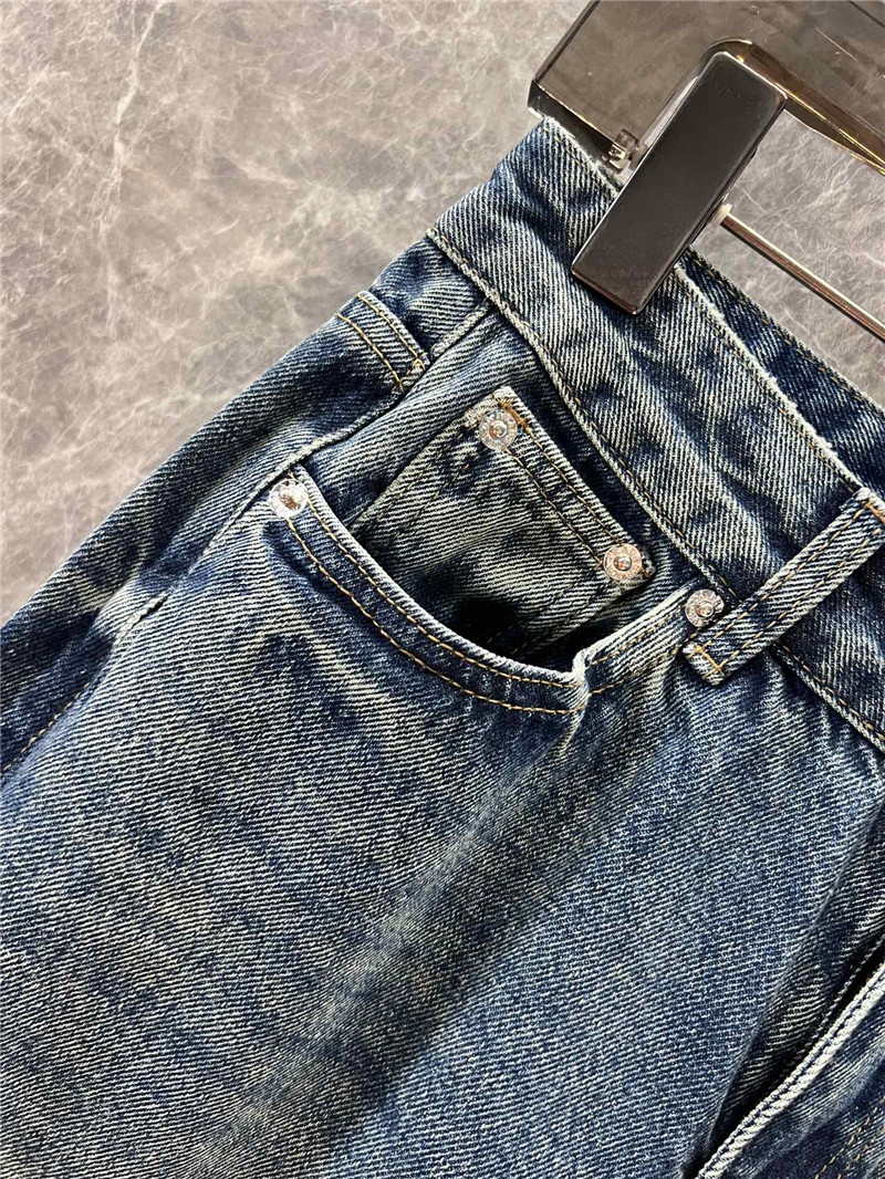 Pra*a triangle logo denim trousers