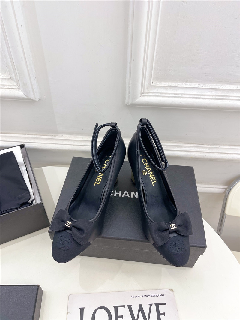 Ch**el bow mary jane heel pumps in black calfskin