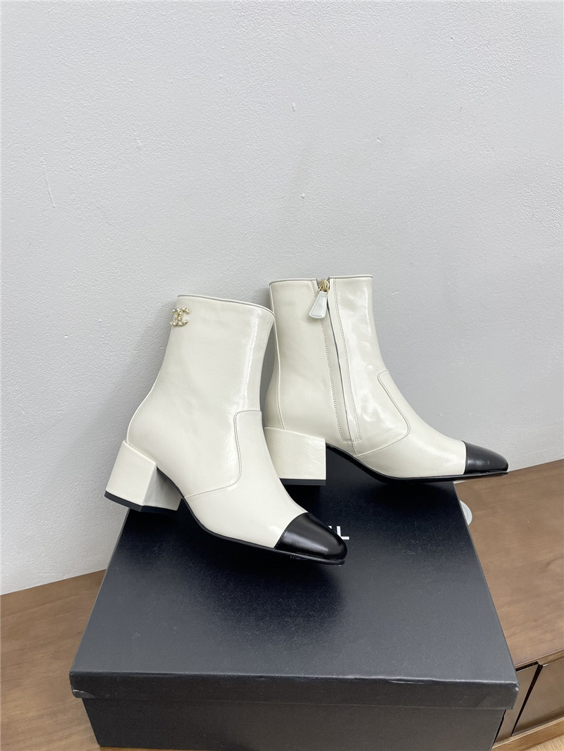 Ch**el calfskin block heel round toe ankle boots