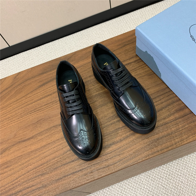 Pra*a black brushed leather derby brogue shoes