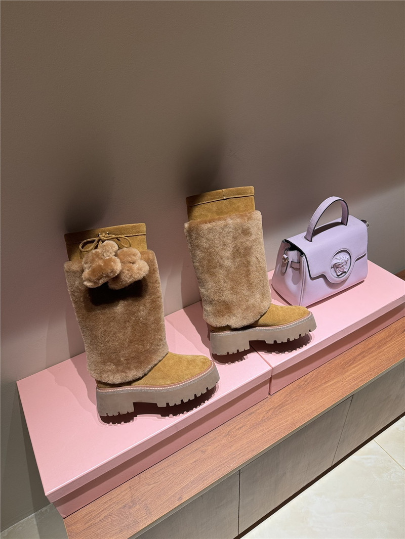 Ce1i*e bulky high boot with triomphe tassels