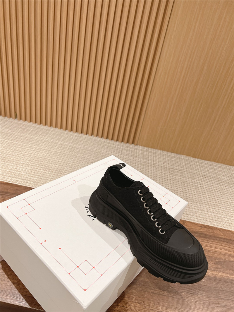 a1exa*der Mcqv*en black tread slick low top sneakers