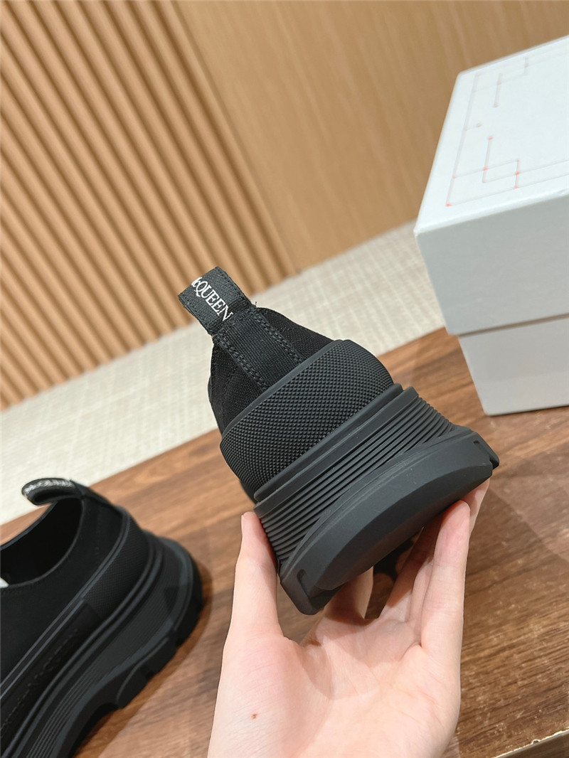a1exa*der Mcqv*en black tread slick low top sneakers
