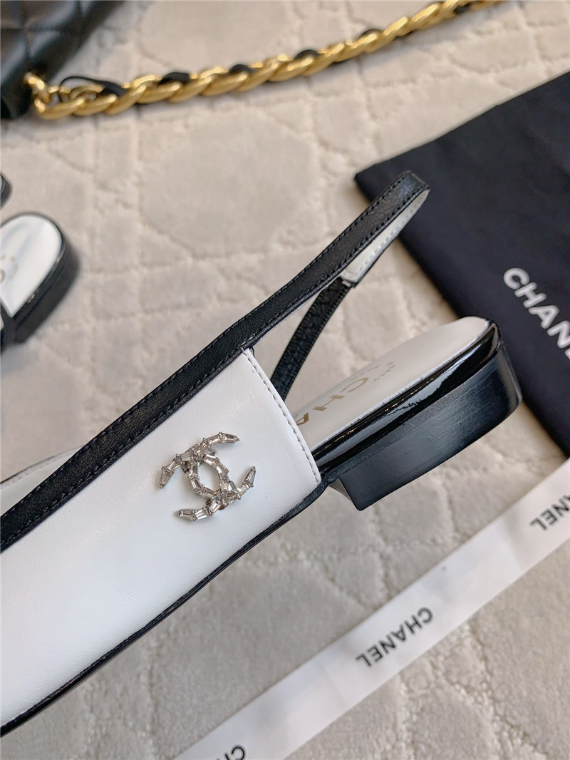 Ch**el pumps & slingbacks in white/black goatskin