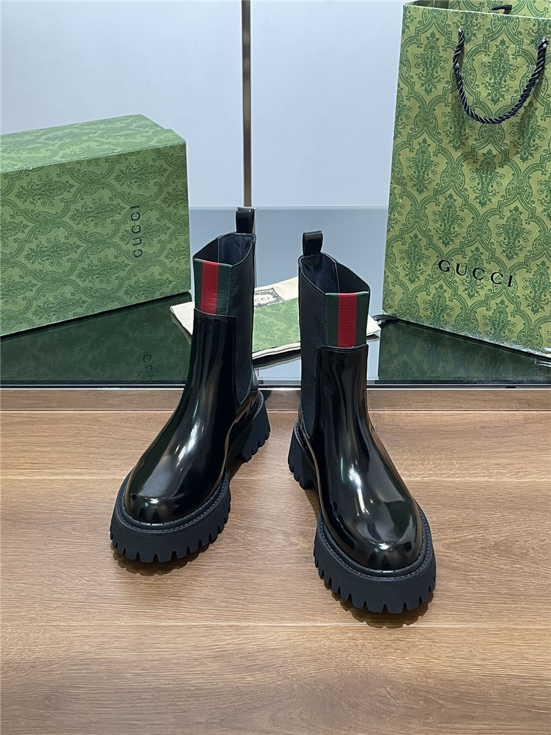 Gvc*1 women’s black patent leather boot with web