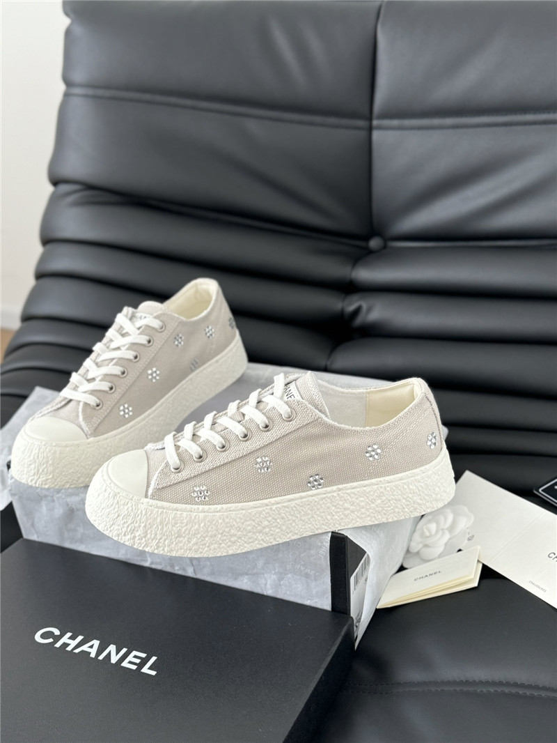 Ch**el beige lace-up low top canvas sneakers