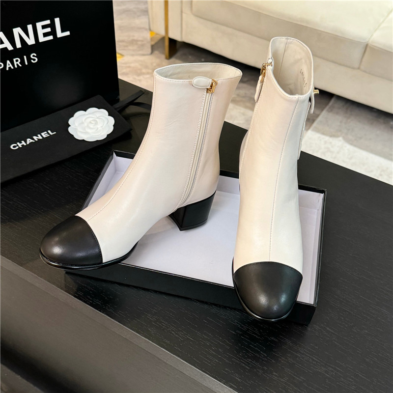 Ch**el calfskin cap toe ankle boots in white