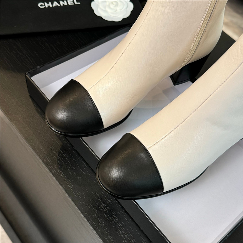Ch**el calfskin cap toe ankle boots in white