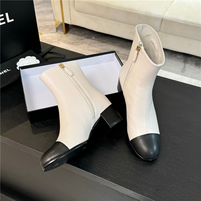 Ch**el calfskin cap toe ankle boots in white