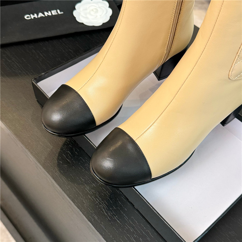 Ch**el brown calfskin cap toe ankle boots