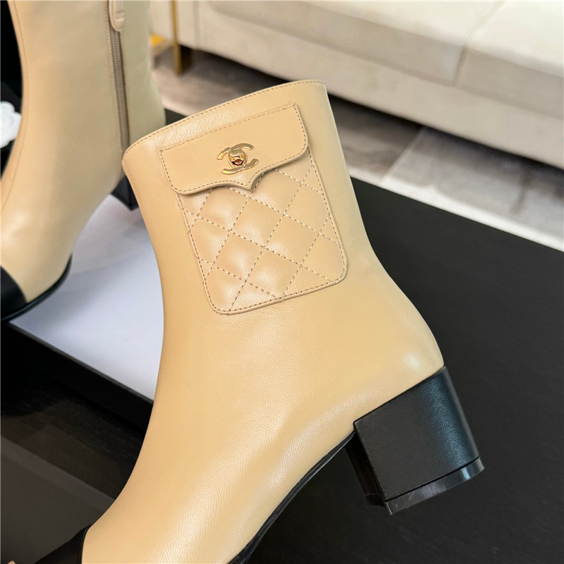 Ch**el brown calfskin cap toe ankle boots
