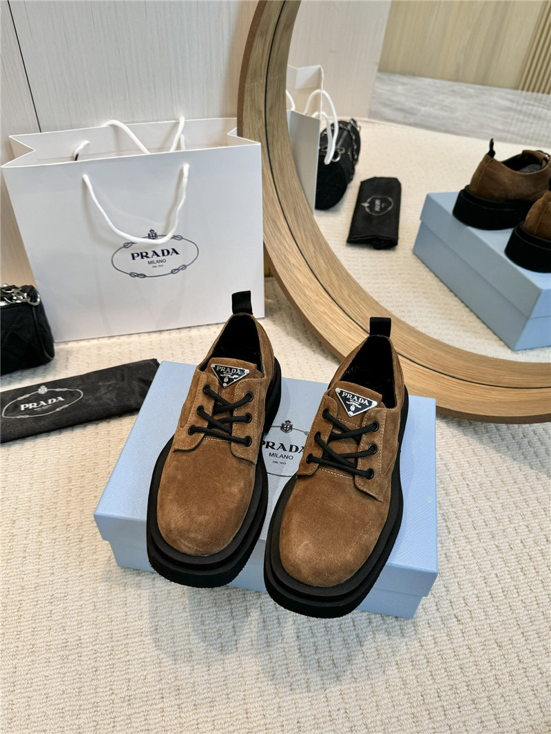 Pra*a suede leather triangle logo loafers