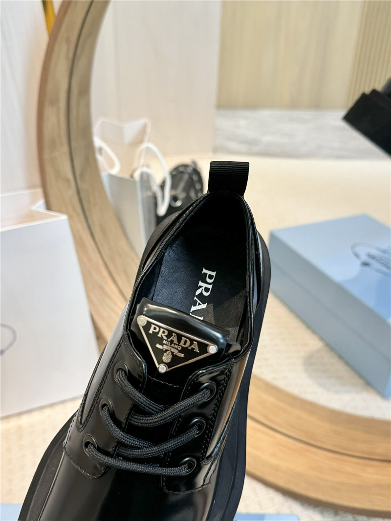 Pra*a leather triangle logo loafers