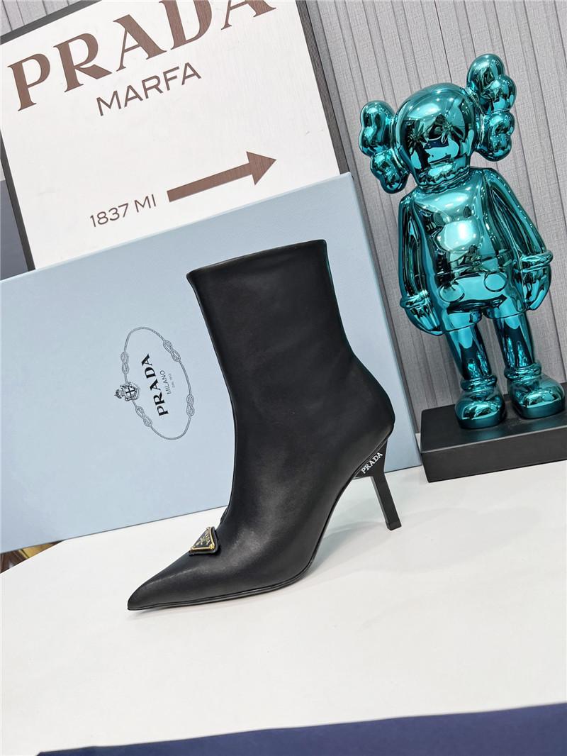 Pra*a black calfskin heeled ankle boots