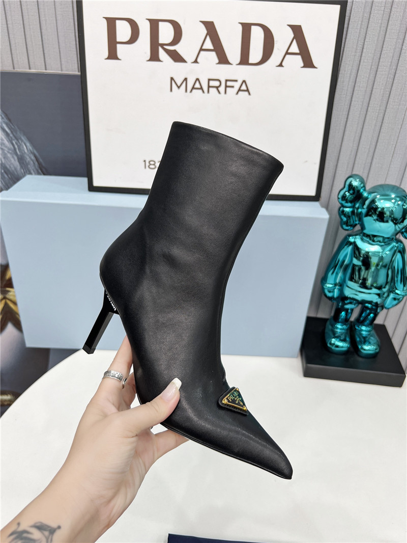 Pra*a black calfskin heeled ankle boots