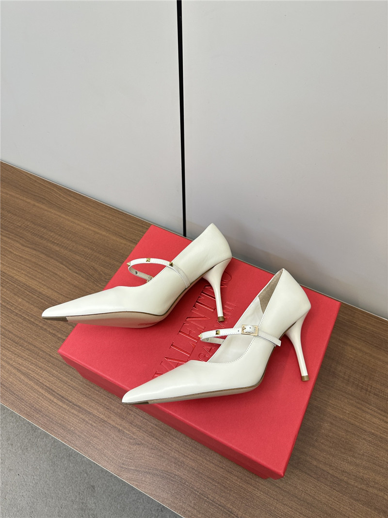 Va1e*ntin0 rockstud white leather pumps