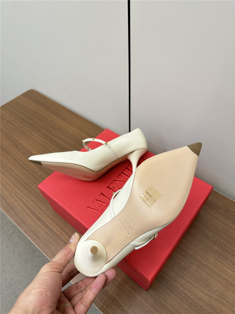 Va1e*ntin0 rockstud white leather pumps