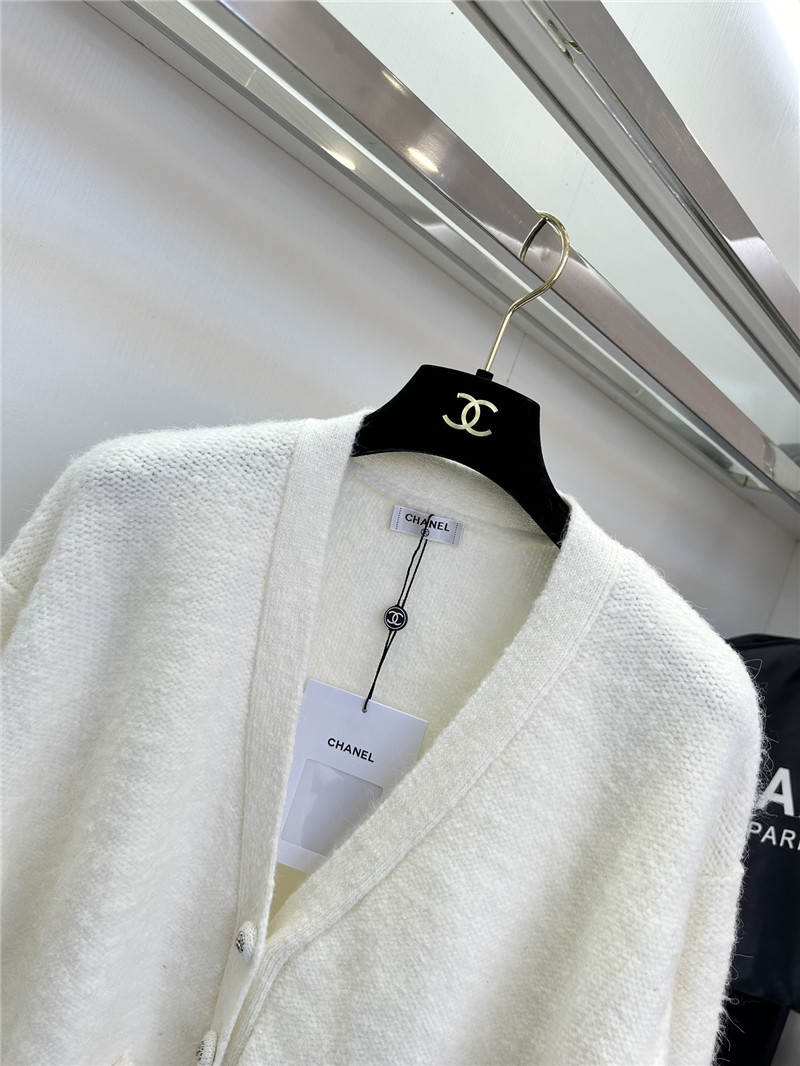 Ch**el white v-neck cardigan with floral cuffs