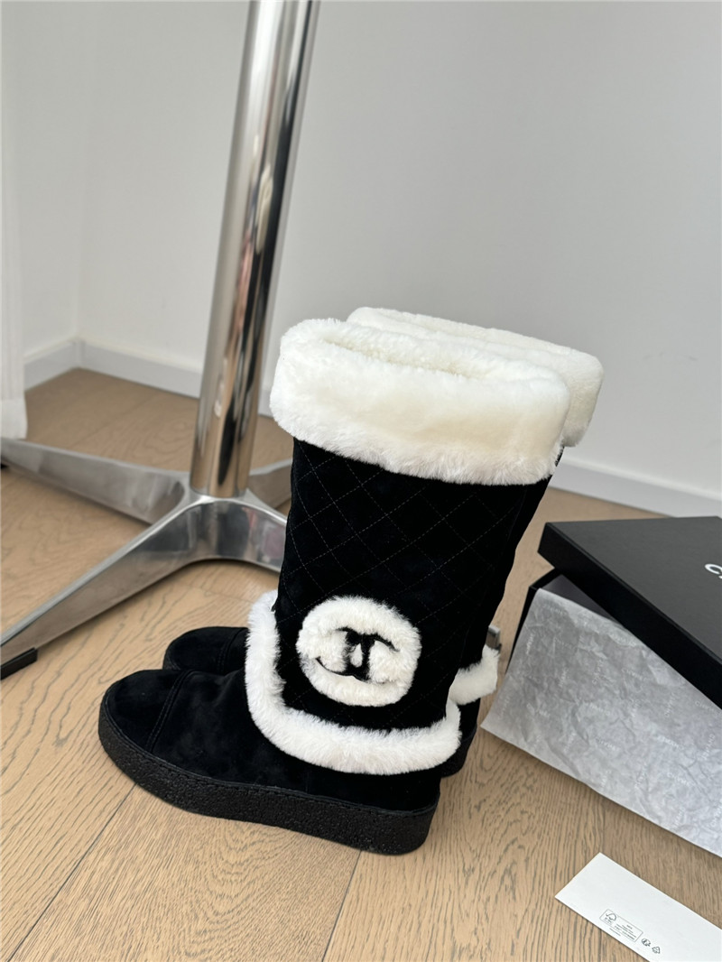 Ch**el logo suede shearling boots in black
